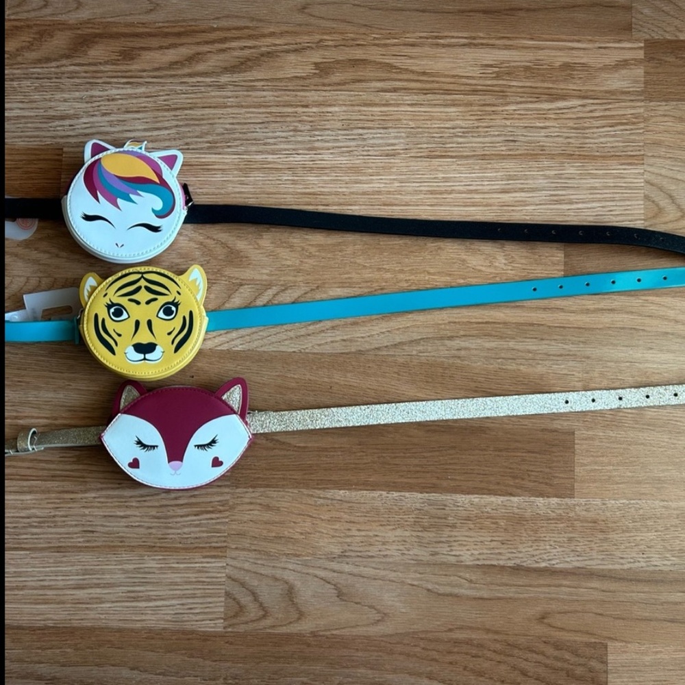 Girls belts with pouch opens up where something small can fit like change/money